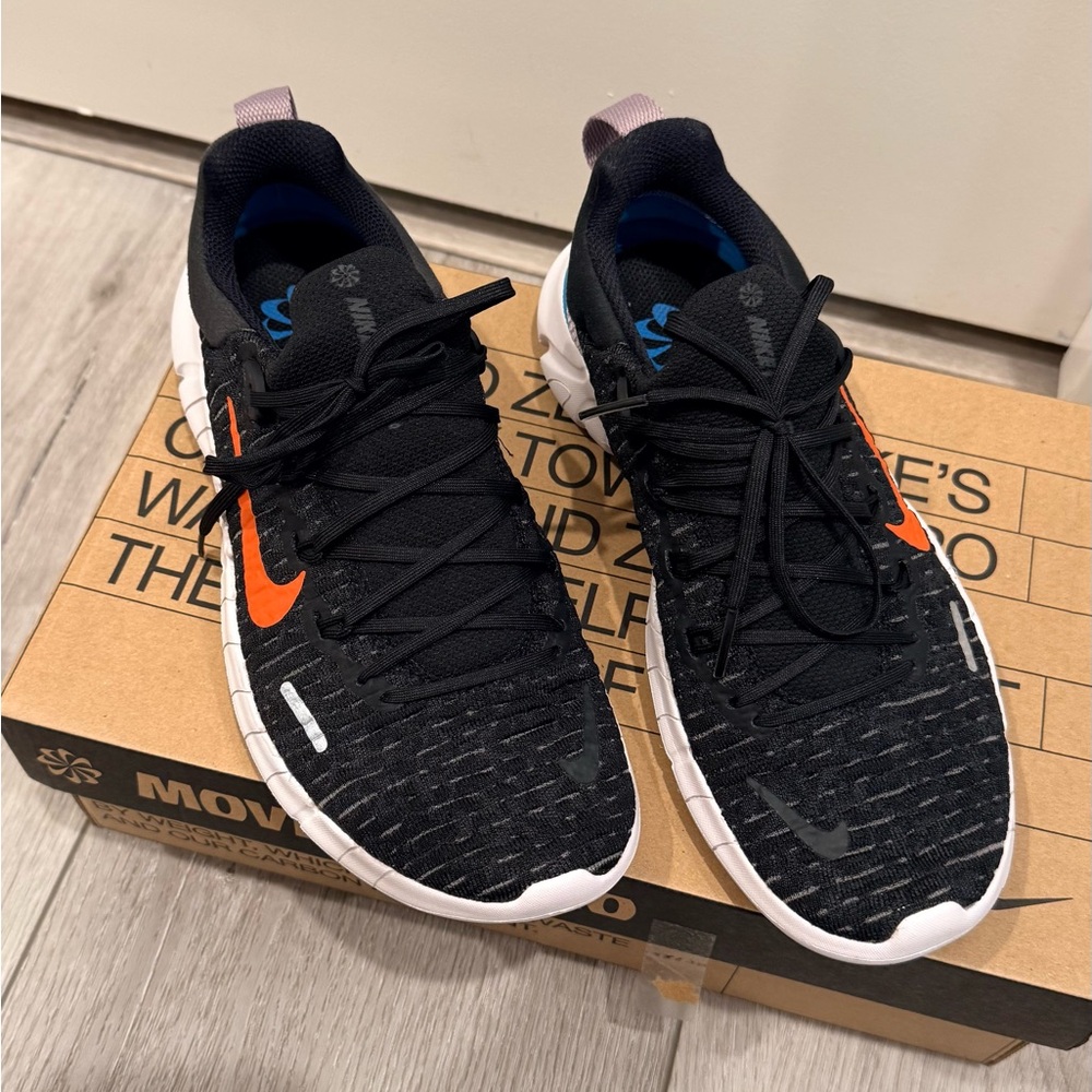 Nike Women Black And Orange Athletic Shoes